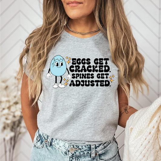 Eggs Get Cracked Unisex t-shirt | Chiropractic Tshirt