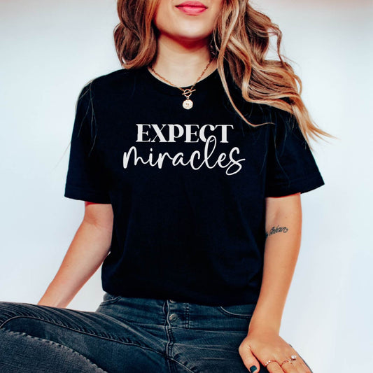 Expect Miracles Unisex T-shirt | Chiropractic Apparel