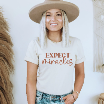 Expect Miracles Unisex T-shirt | Chiropractic Apparel